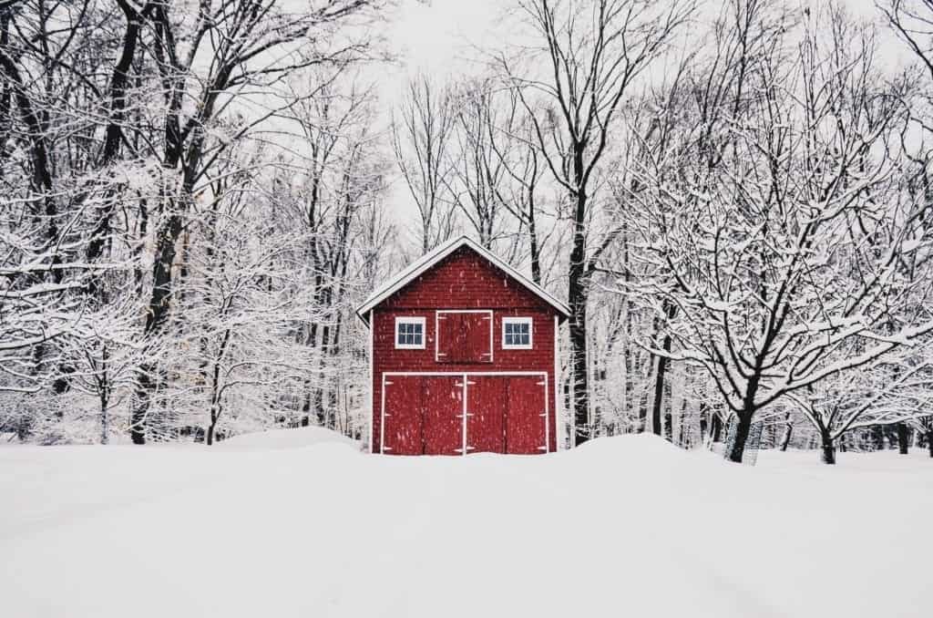 Red barn during snow